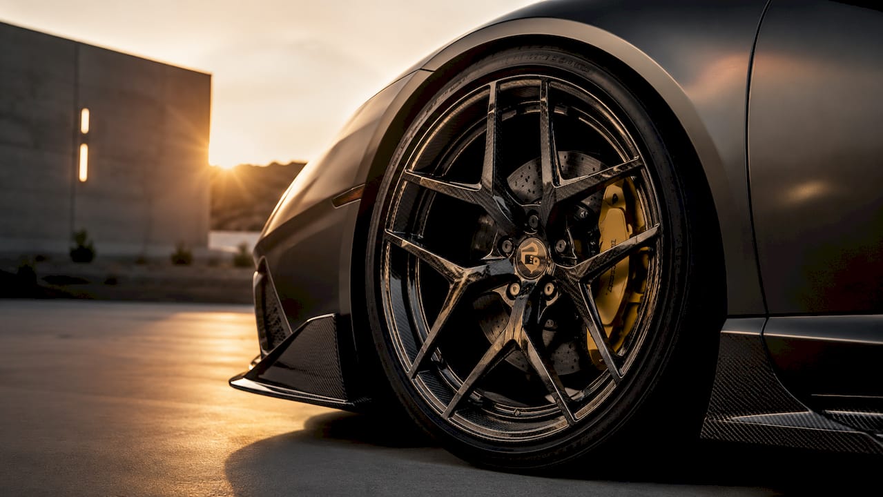 Close-up of forged carbon fiber wheel on McLaren 720S