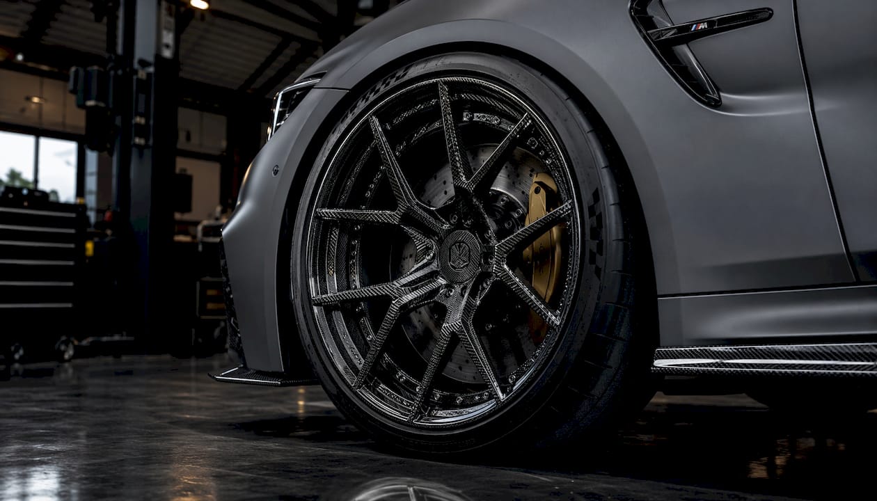 Close-up forged carbon fiber wheel on McLaren 720S