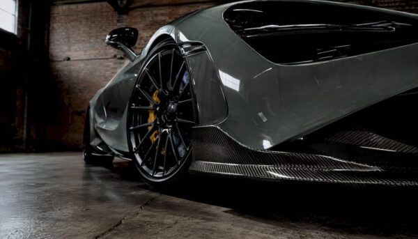 Close-up of McLaren 720S front carbon fiber and wheel