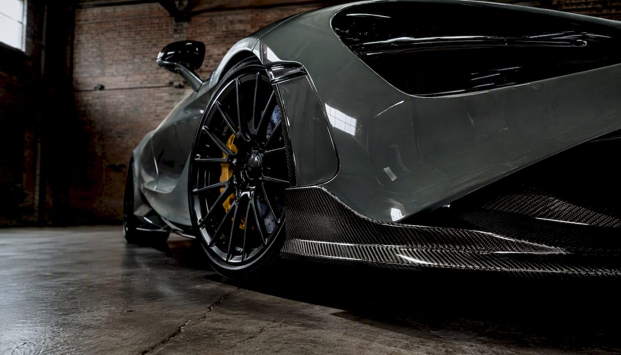 Close-up of McLaren 720S front carbon fiber and wheel