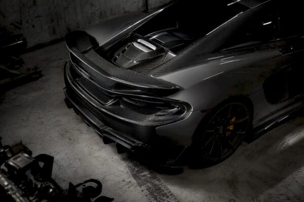 Close-up of carbon fiber front splitter and diffuser detail