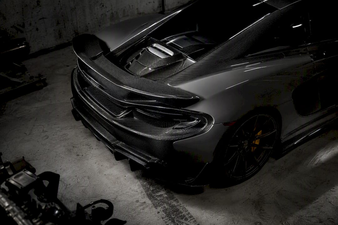 Close-up of carbon fiber front splitter and diffuser detail