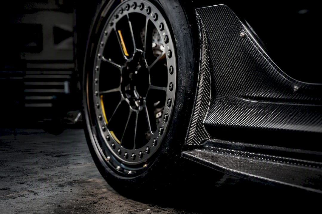 Close-up of forged beadlock wheel and carbon fiber detail