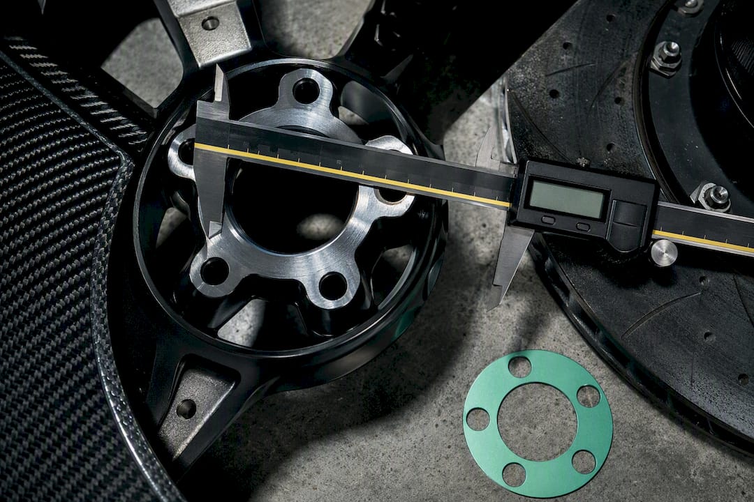 Caliper measuring five-lug wheel pattern