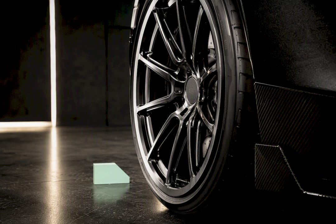 McLaren wheel positioned beneath fender